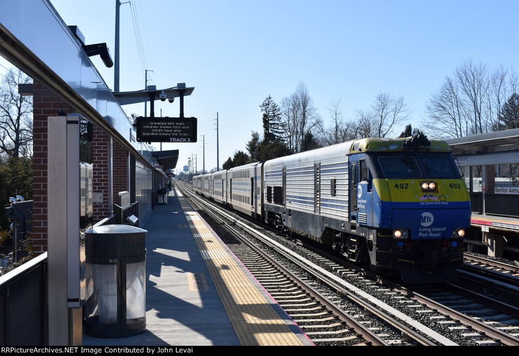  LIRR Train # 6038 heading to Montauk with DE30AC # 402 as power 